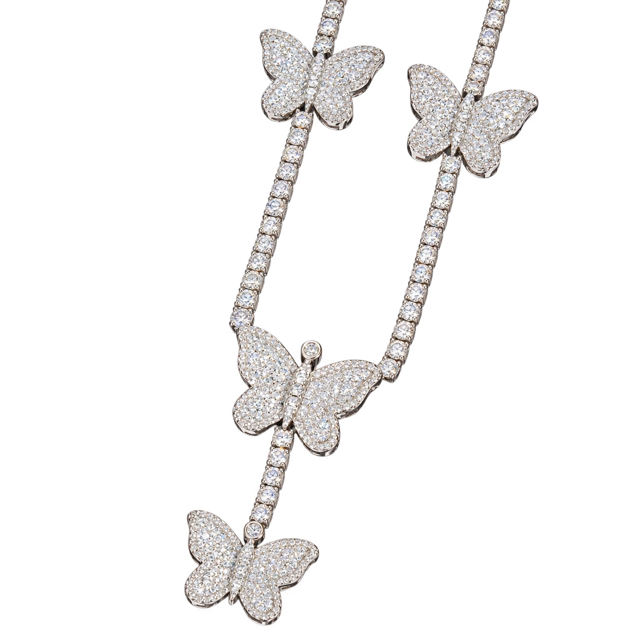 Stone-set butterfly motifs along a tennis chain — AI-edited studio preview