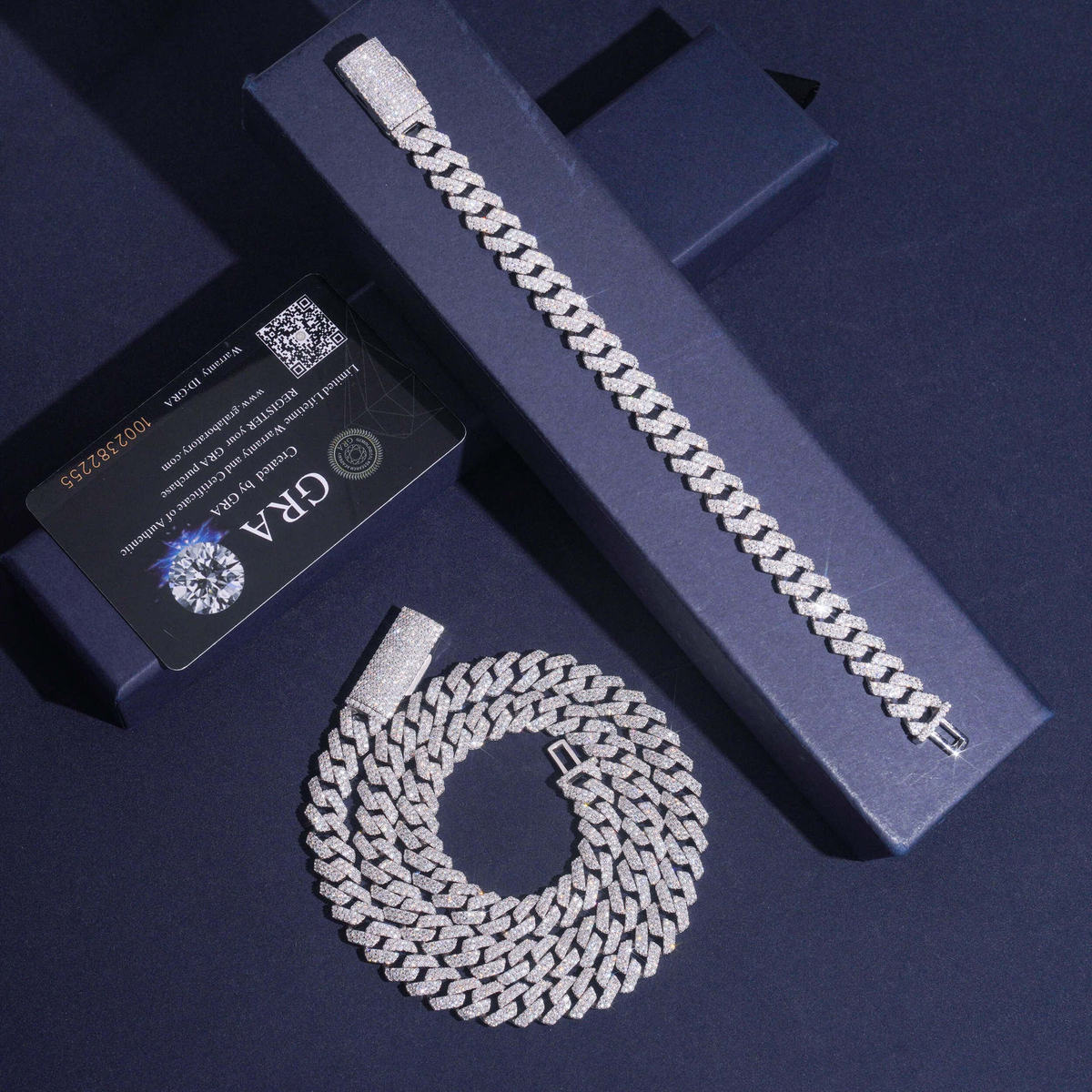 12MM Moissanite Prong-Set Miami Cuban Link Chain and Bracelet – S925 Silver with GRA card in the background