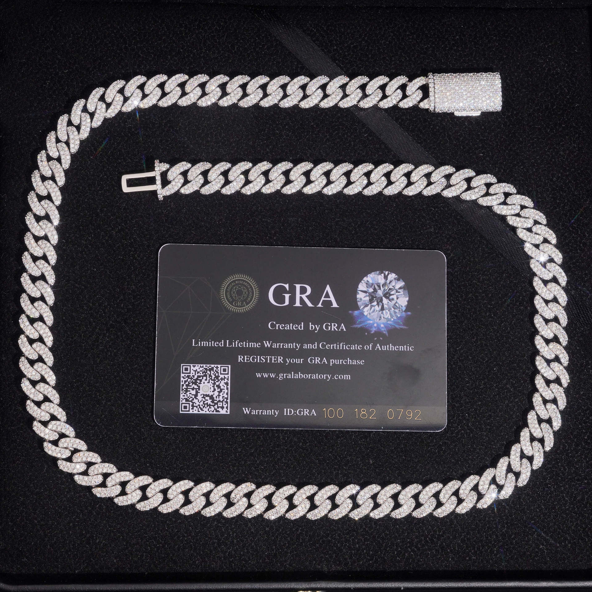 20MM Moissanite Pavé Miami Cuban Link Chain – S925 Silver with GRA card in the background