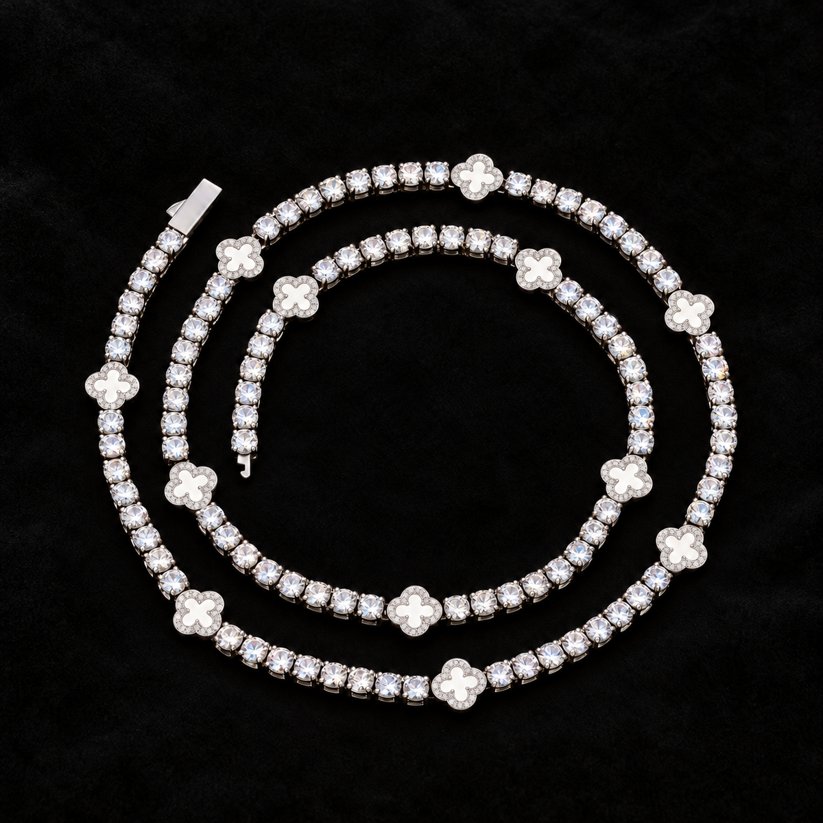 Black Clover Tennis Chain on black velvet with crisp gemstone detail