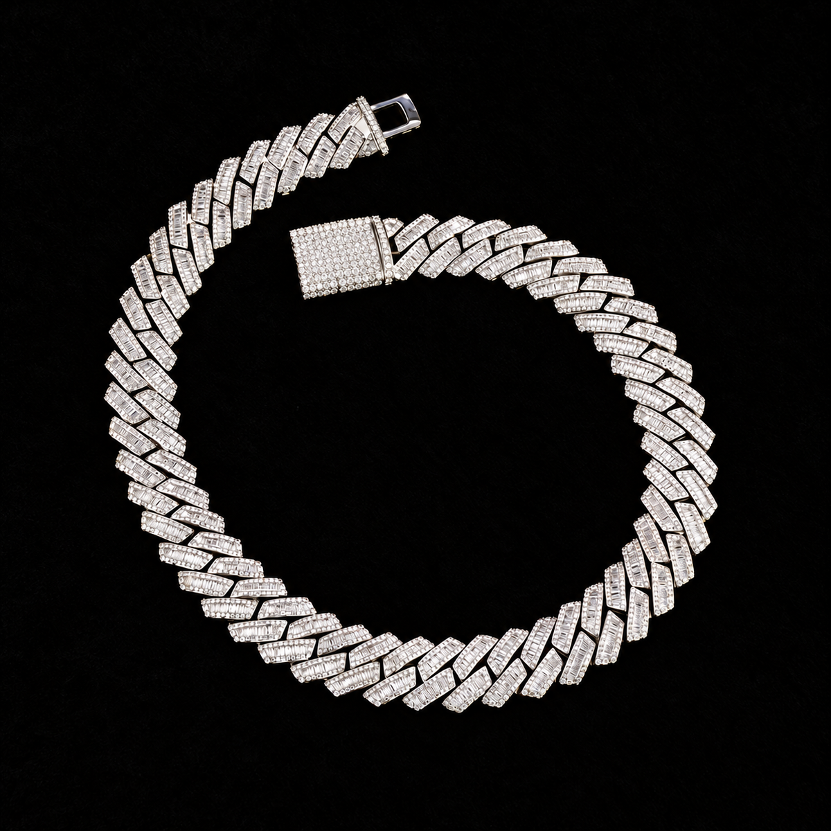 Prong Baguette Cuban Chain with rectangular baguette link stones and pavé clasp on black velvet