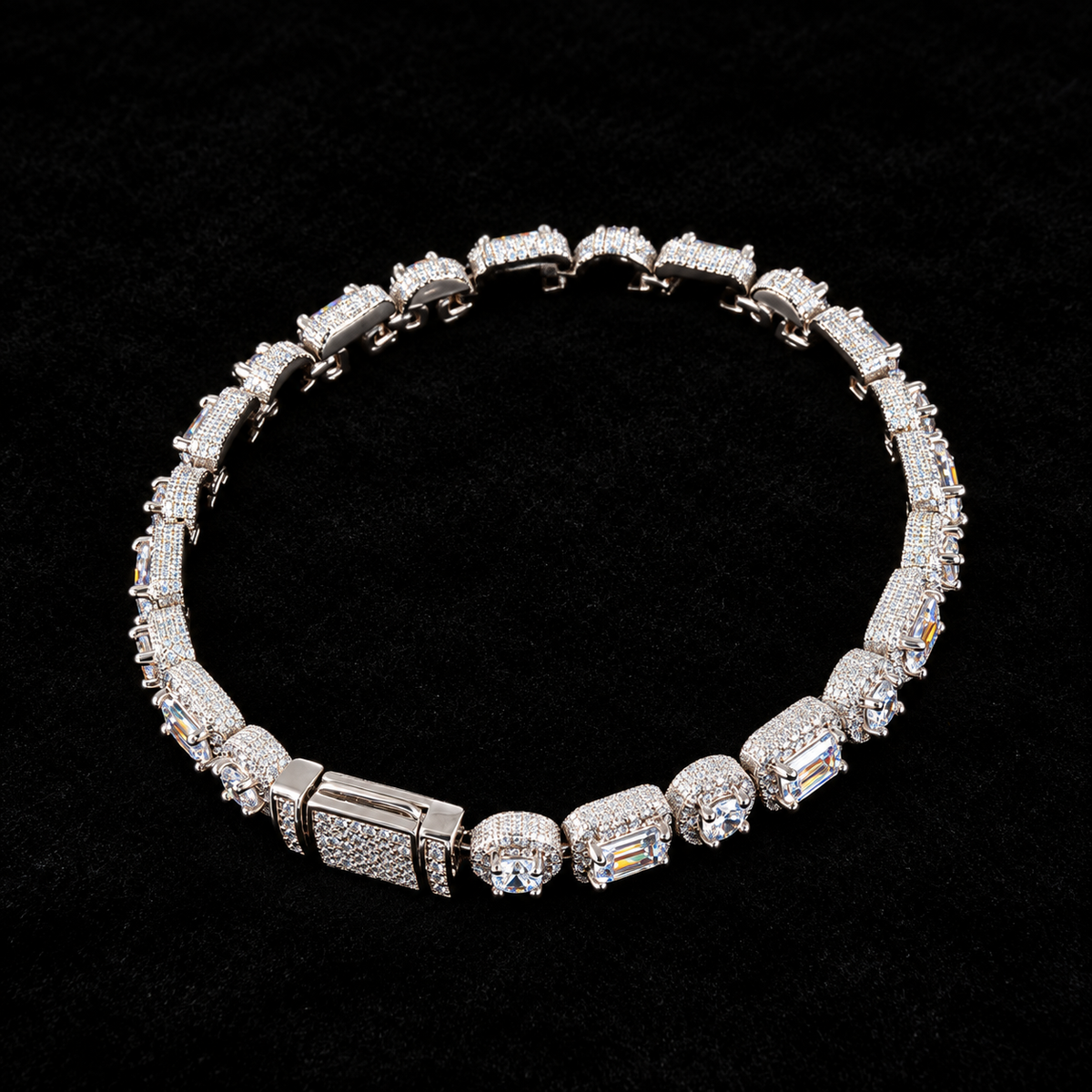 Emerald Clustered Tennis Bracelet on black velvet