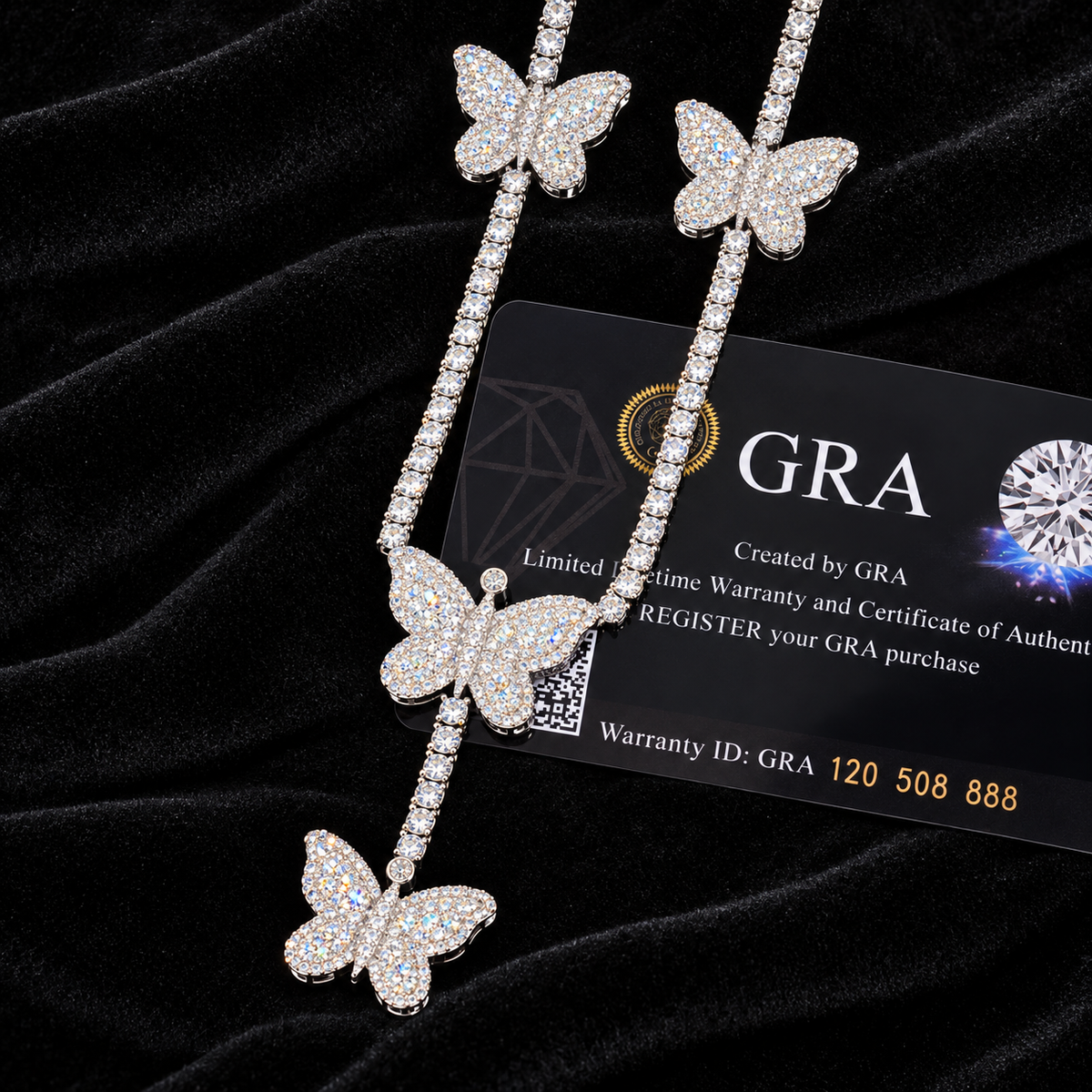 Butterfly Tennis Chain with GRA card in the background