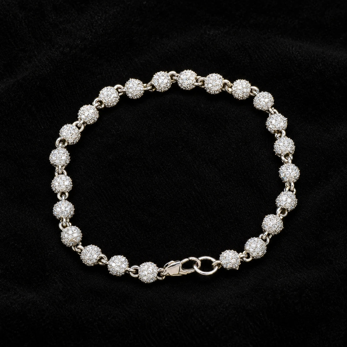 6mm Iced Ball Bracelet on a black background