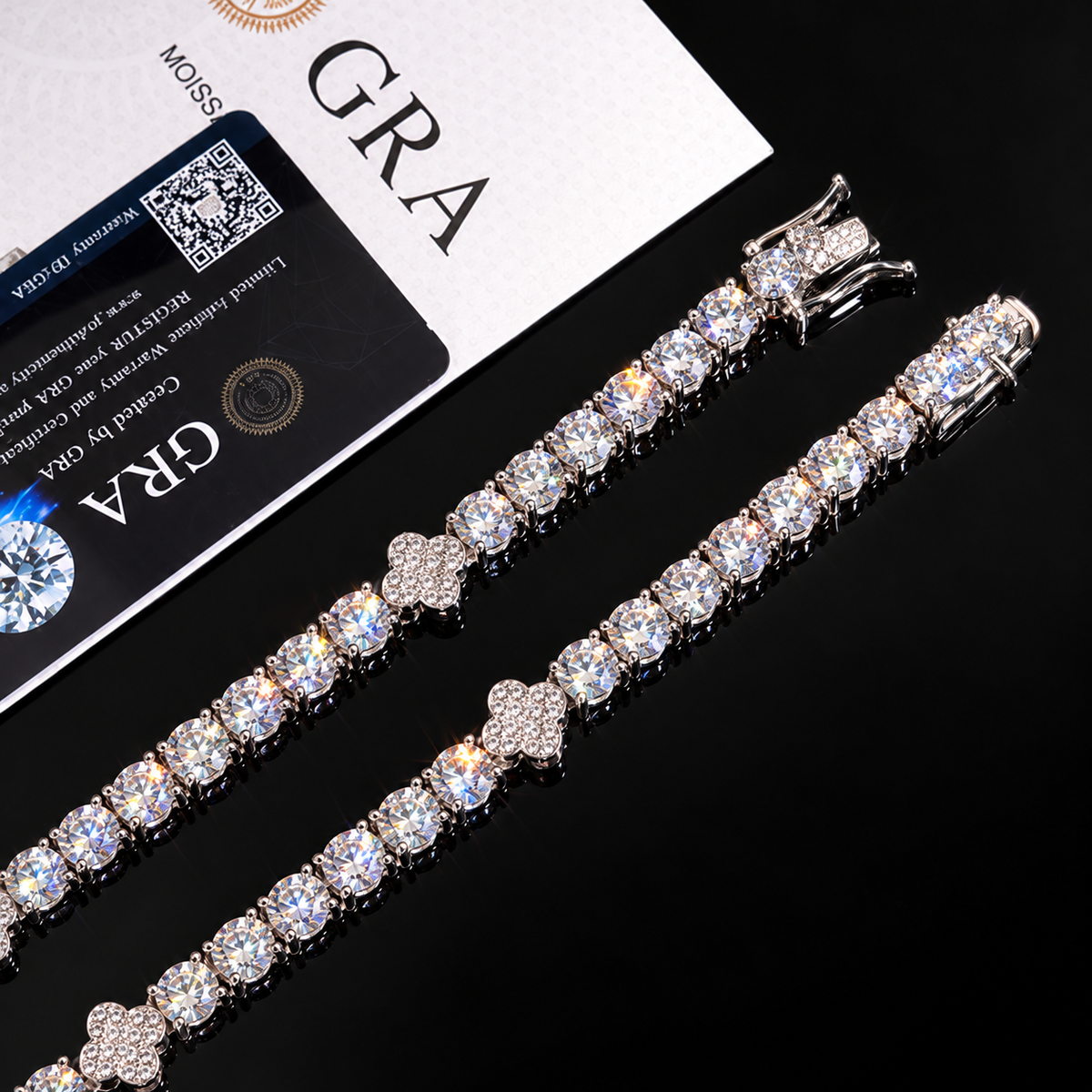 5MM Moissanite Clover Tennis Bracelet – S925 Silver with GRA card in the background