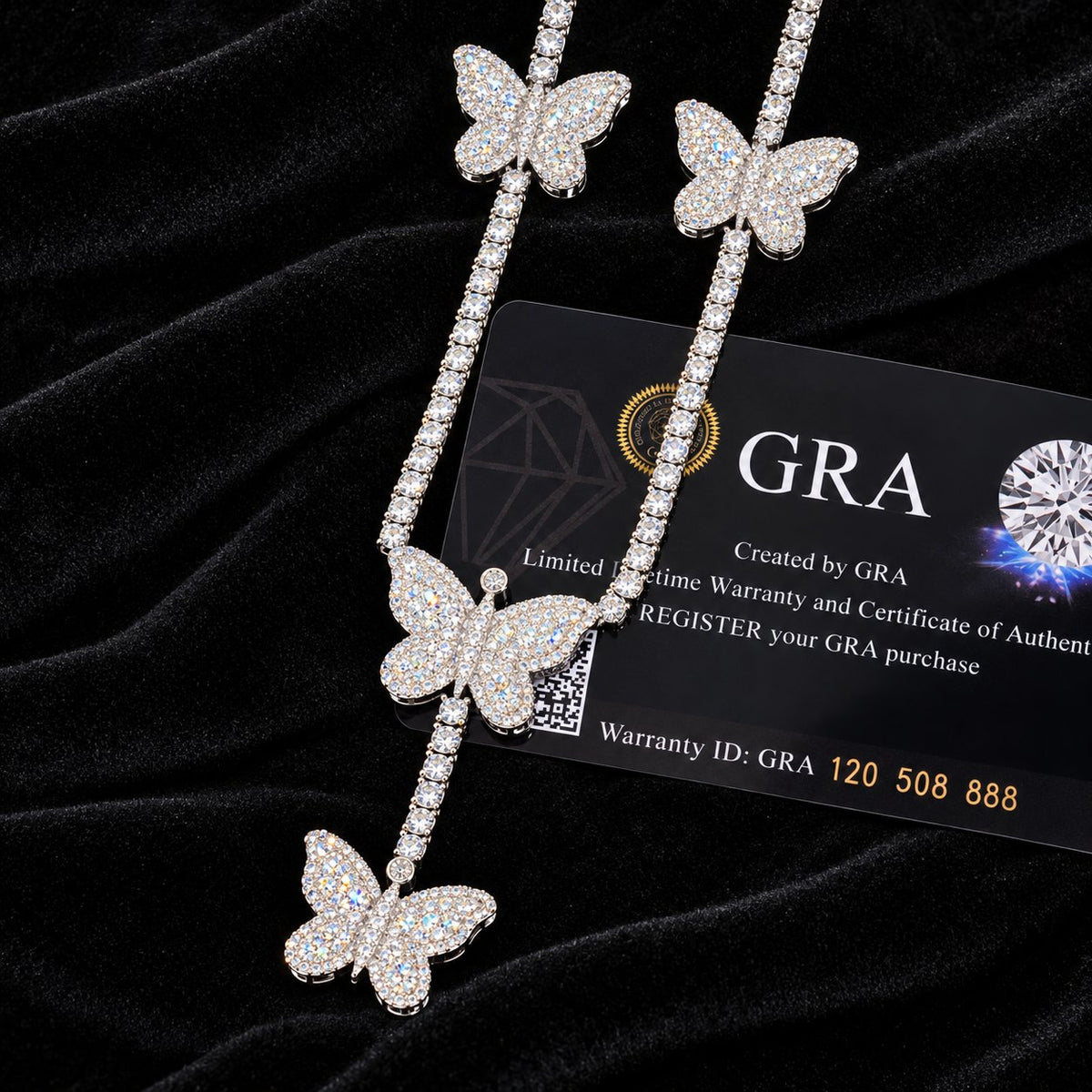 Butterfly Tennis Chain on a black background, with GRA card visible