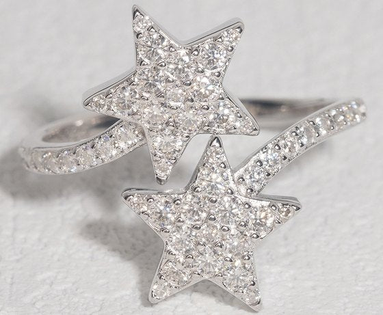 Double-Star Slim Moissanite Ring on a black background