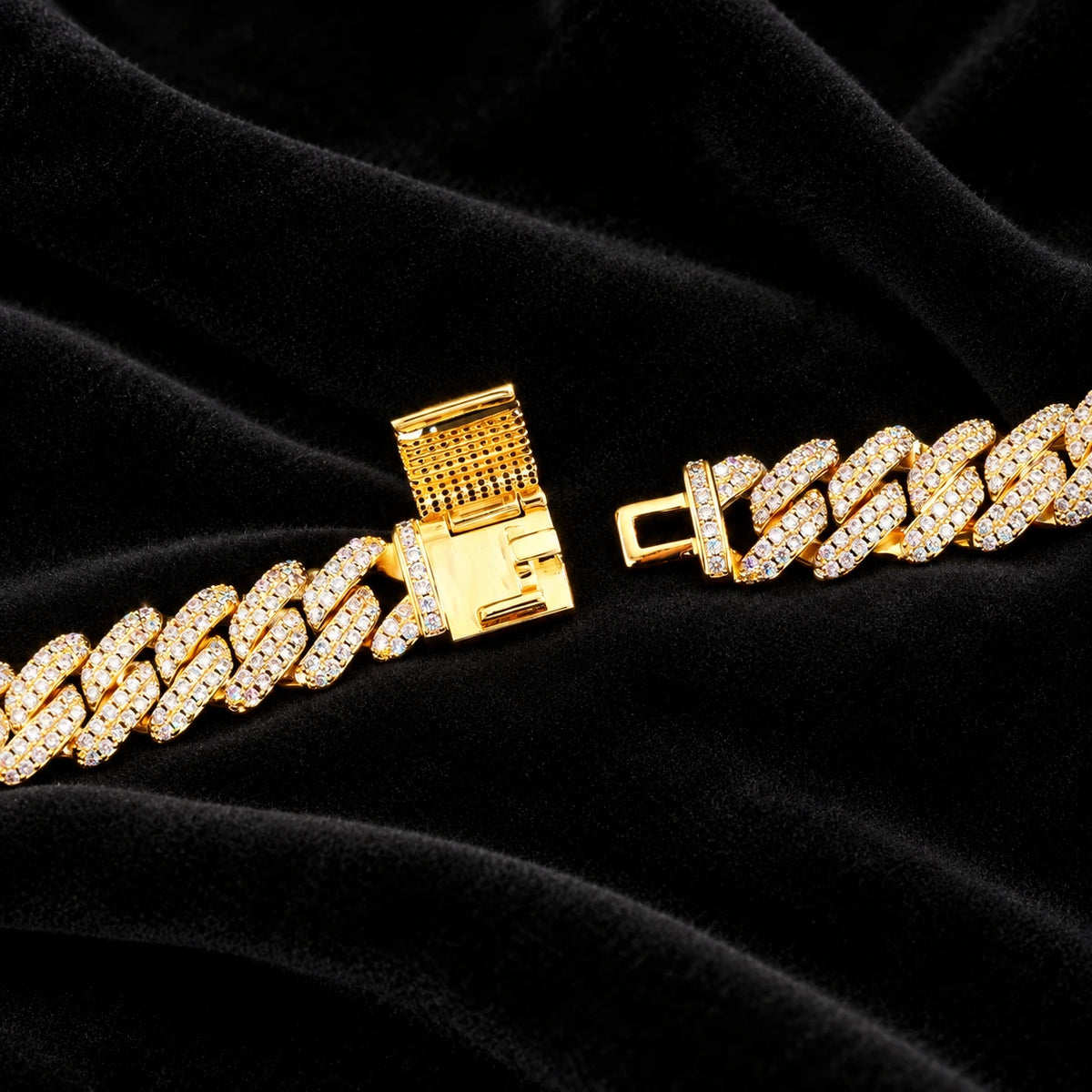 12mm Prong Cuban Chain — original finish on black velvet with moissanite fire