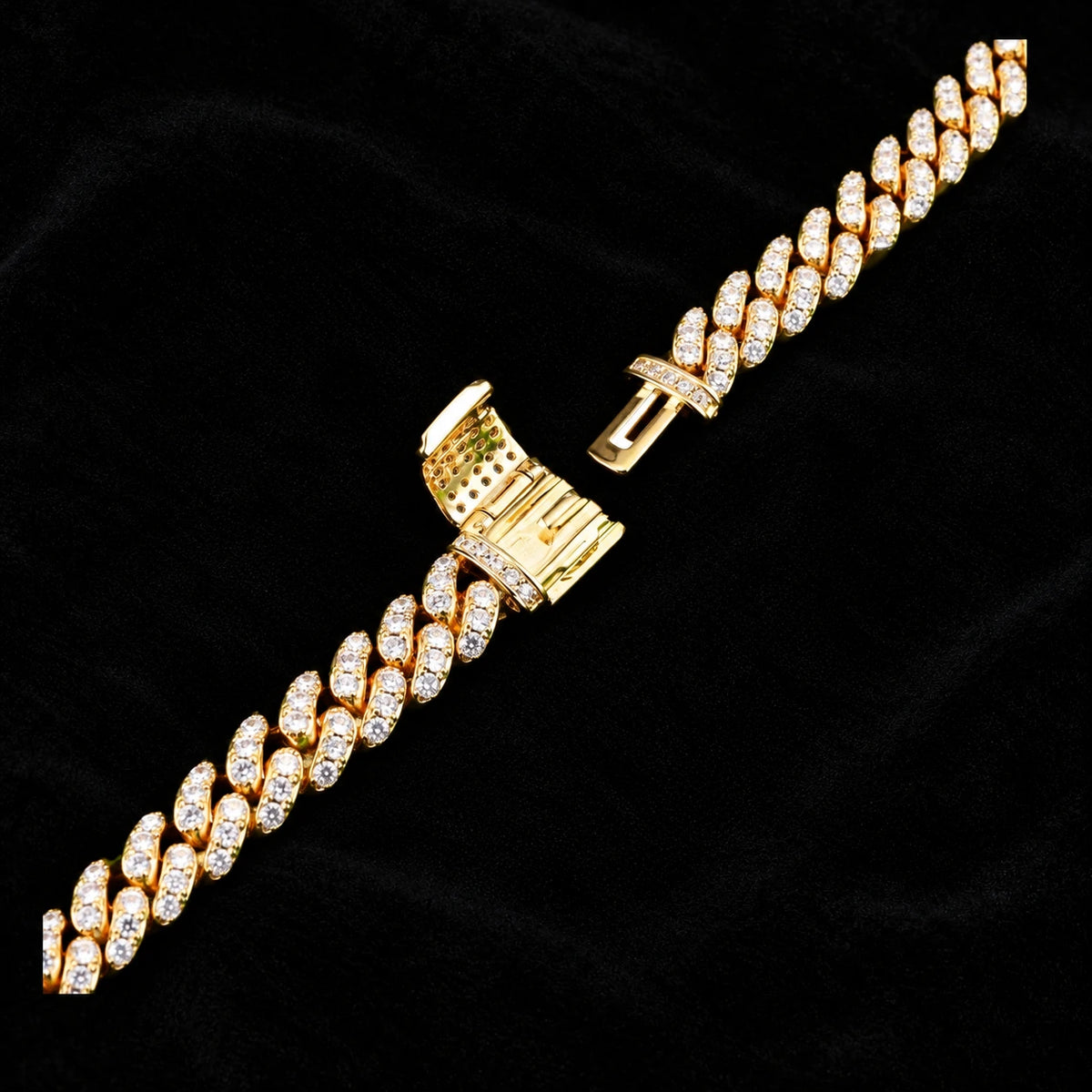 8mm Cuban Chain in yellow gold on black velvet — open clasp detail