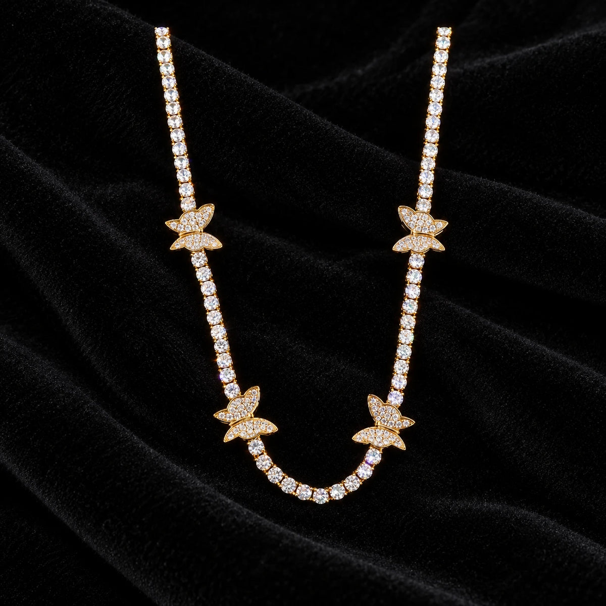 4mm Butterfly Tennis Chain — original finish on black velvet with moissanite fire
