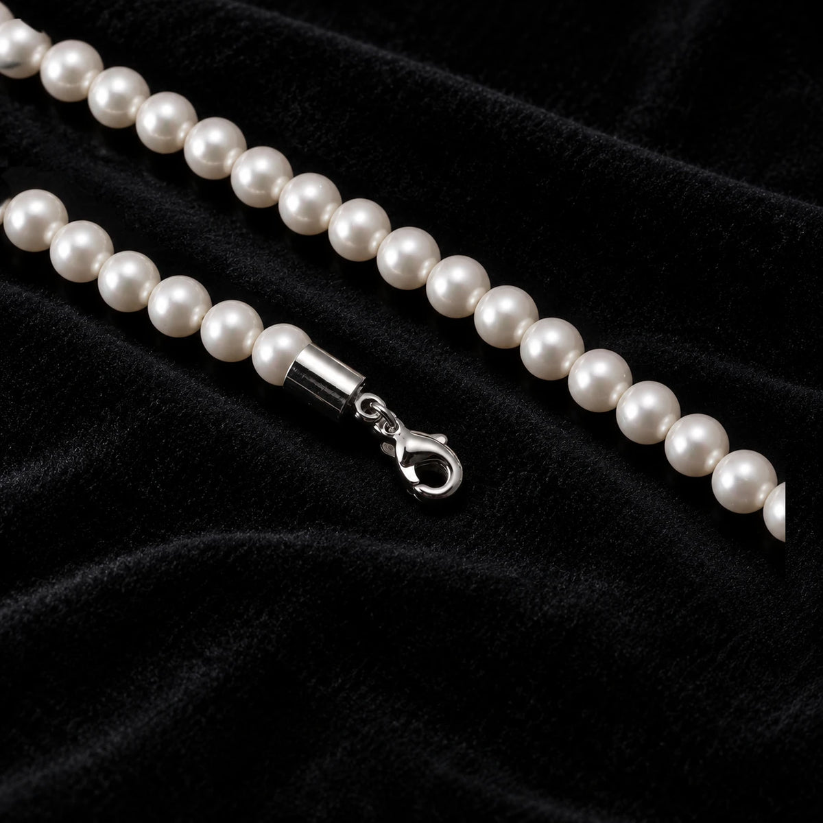 6mm Pearl Bracelet — original finish on black velvet with moissanite fire