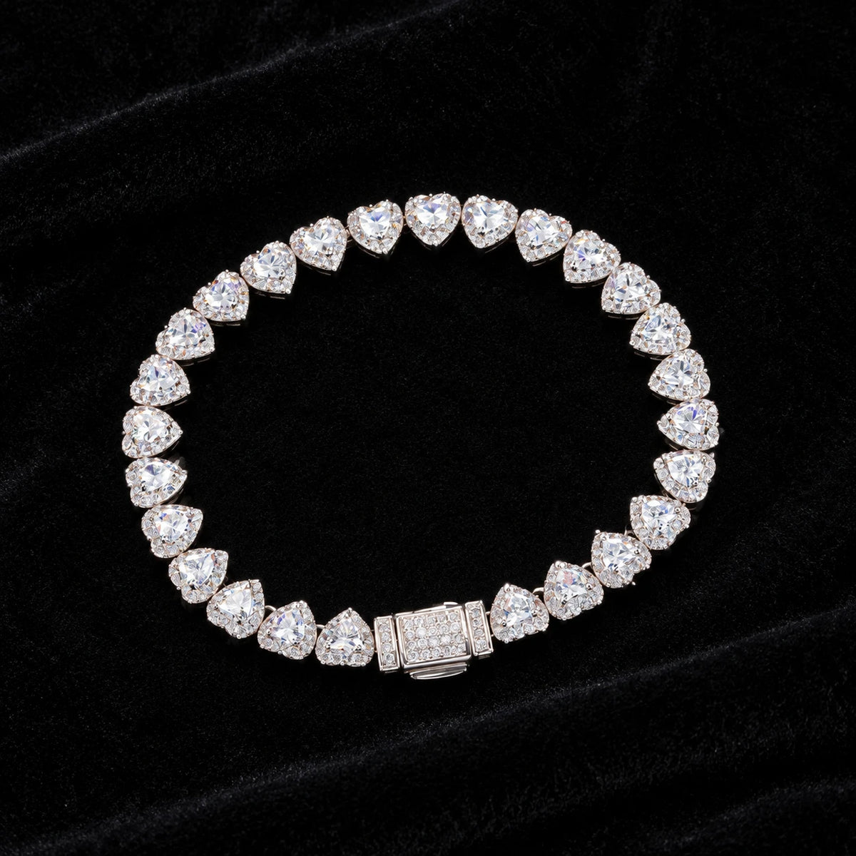 7mm Heart Cut Cluster Tennis Bracelet on a black background