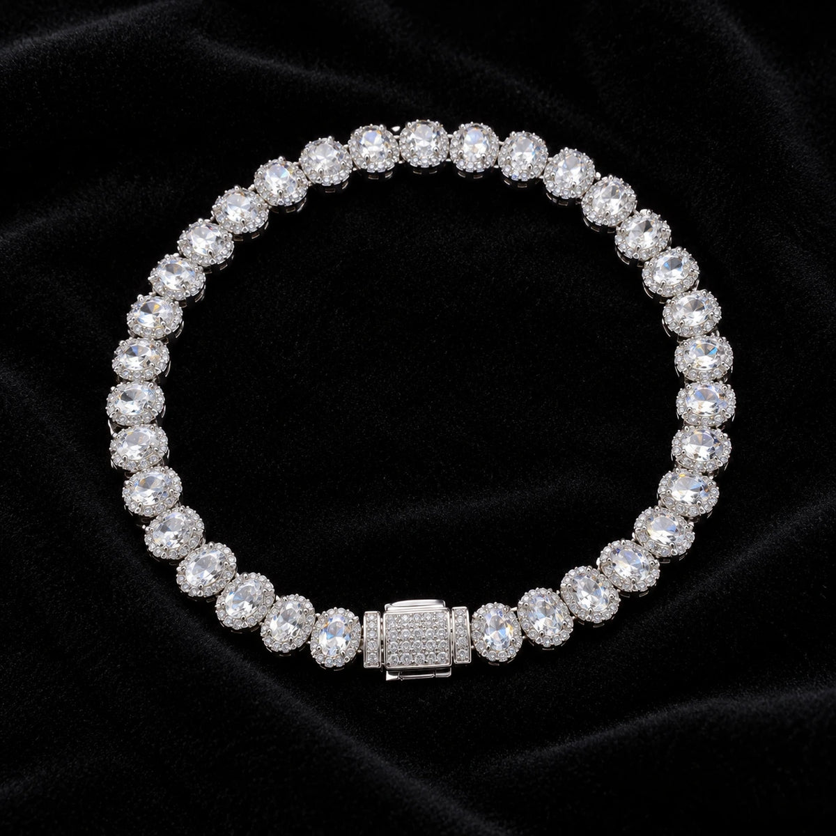 7mm Oval Cluster Tennis Bracelet on a black background