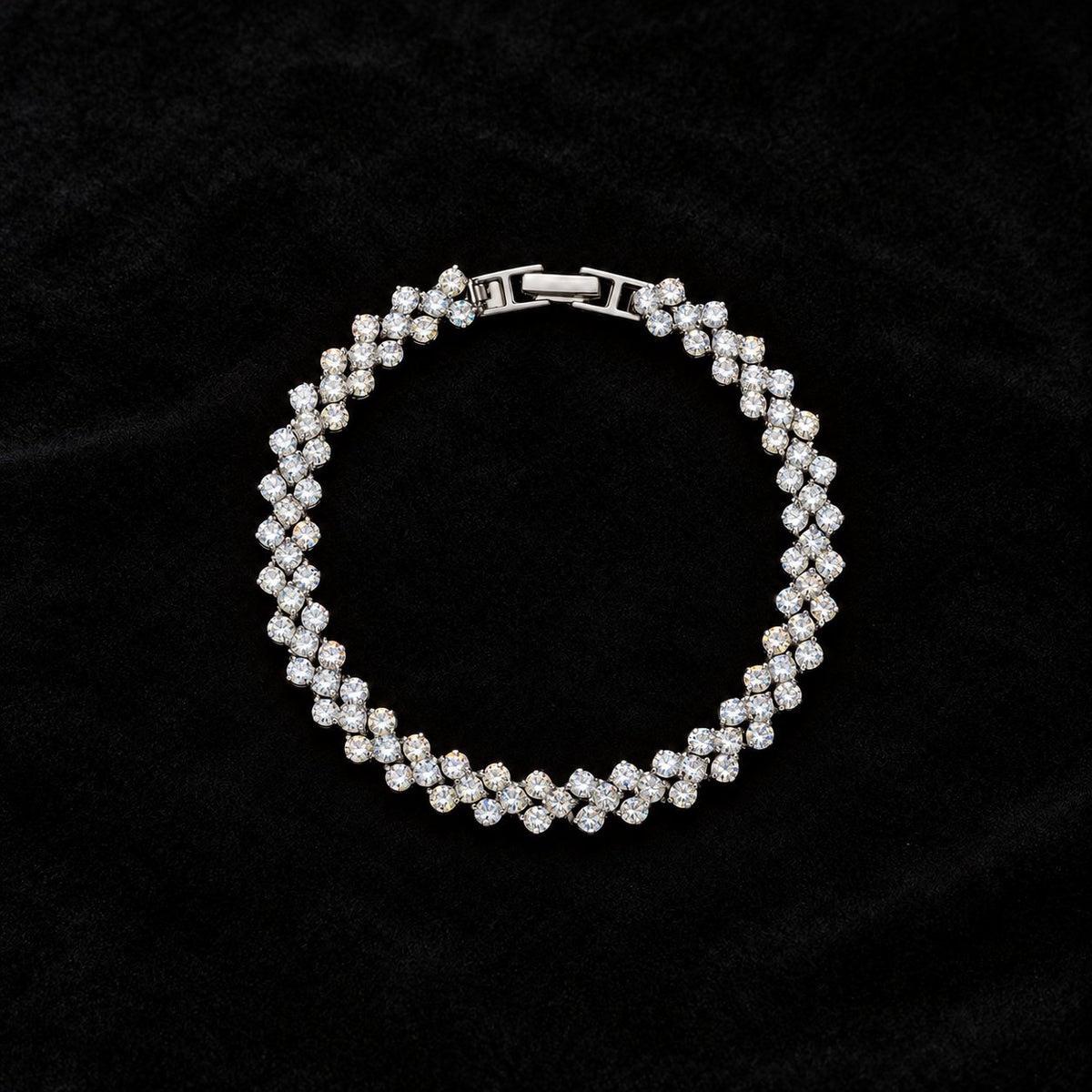 Pear Cluster Tennis Bracelet on a black background