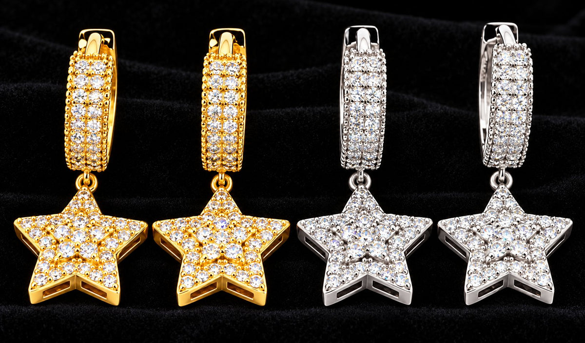 Star Moissanite Drop Earrings on a black background