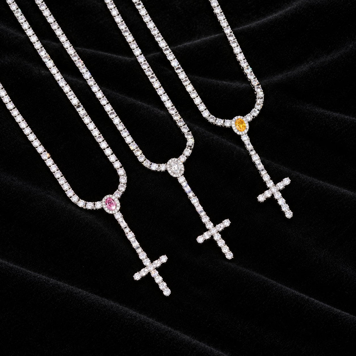 3mm Tennis Cross Y Chain on black velvet, three center-stone colors