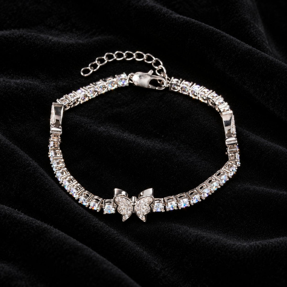 4mm Butterfly Tennis Bracelet — original finish on black velvet with moissanite fire